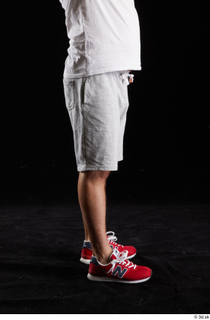 Louis  2 dressed flexing grey shorts leg red sneakers…